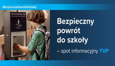 Baner ze zdjęciem dziecka dezynfekującego ręce oraz napisem informującym o powstaniu spotu informacyjnego na temat bezpiecznego powrotu uczniów do szkół